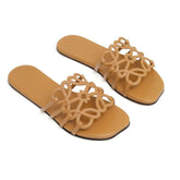 Loewe Petal Anagram Slides in Camel Brown Calfskin - Cloud TreadLadies SandalsLifestyle Sneakers UAEluxury sneakers dubai